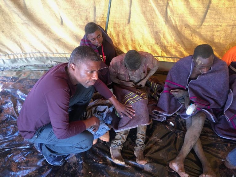 IMAGES: Dexter Nduna with rescued miners