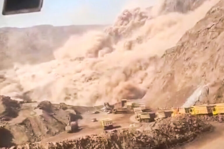 Miners and trucks swallowed in deadly Chinese coal mine collapse