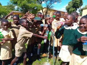 School children drinking water supplied by Venice Mine