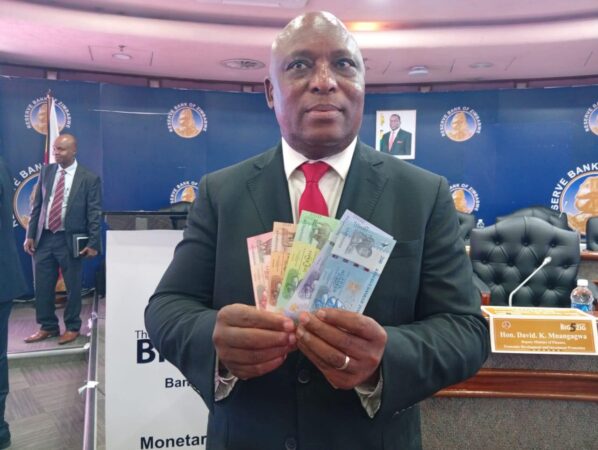 John Mushayavanhu with the New ZiG Banknotes John Mushayavanhu with the New ZiG Banknotes.jpg