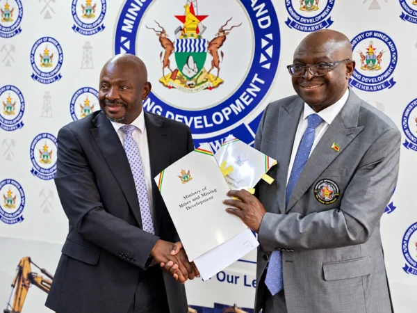 Zimbabwe Ministry Handshake and Document Handover